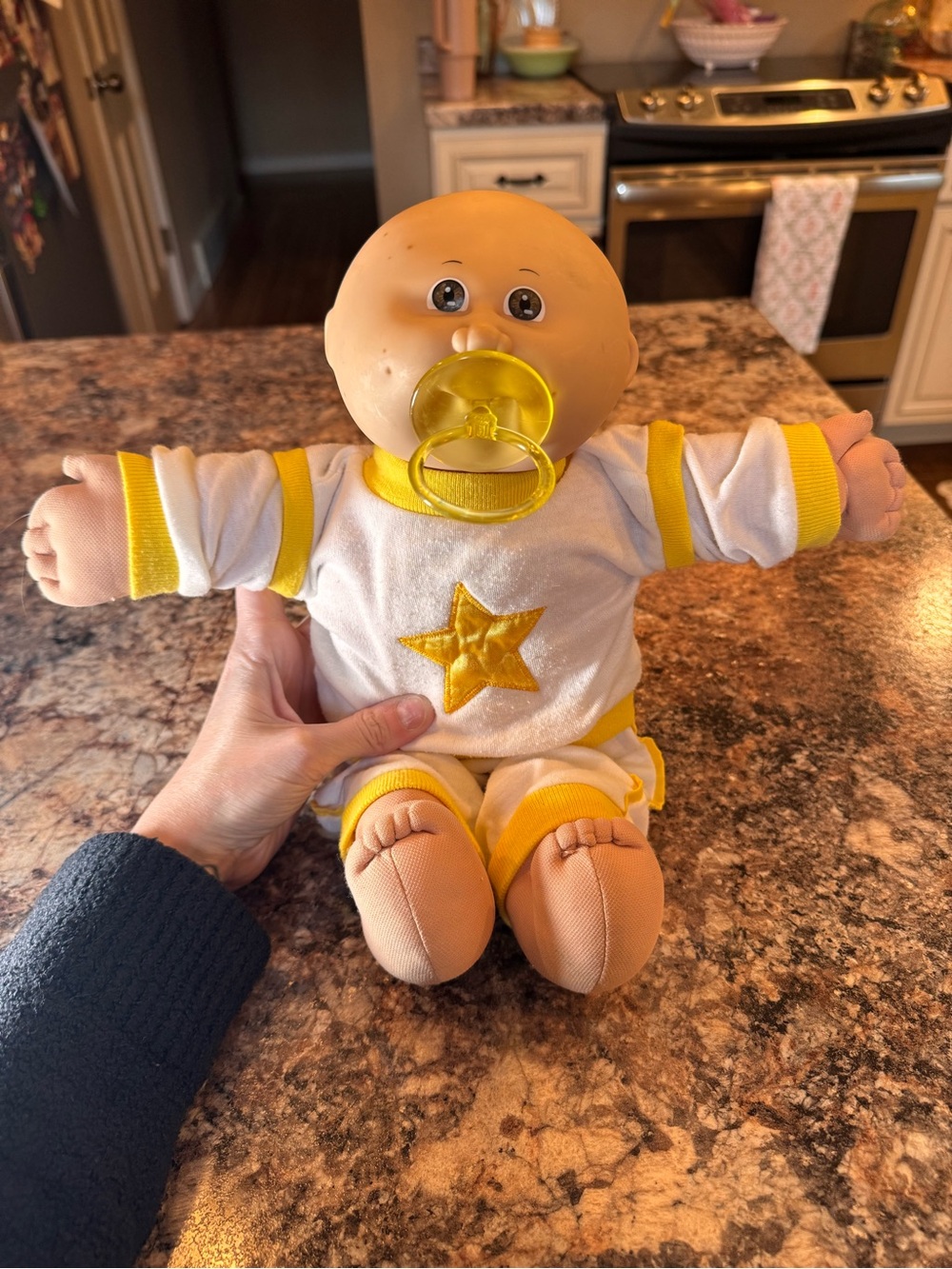 1980s Coleco Cabbage Patch Kids Brown Eyed Preemie doll featuring a bald head